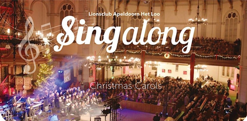 Druk bezochte Grote Kerk met sfeerverlichting